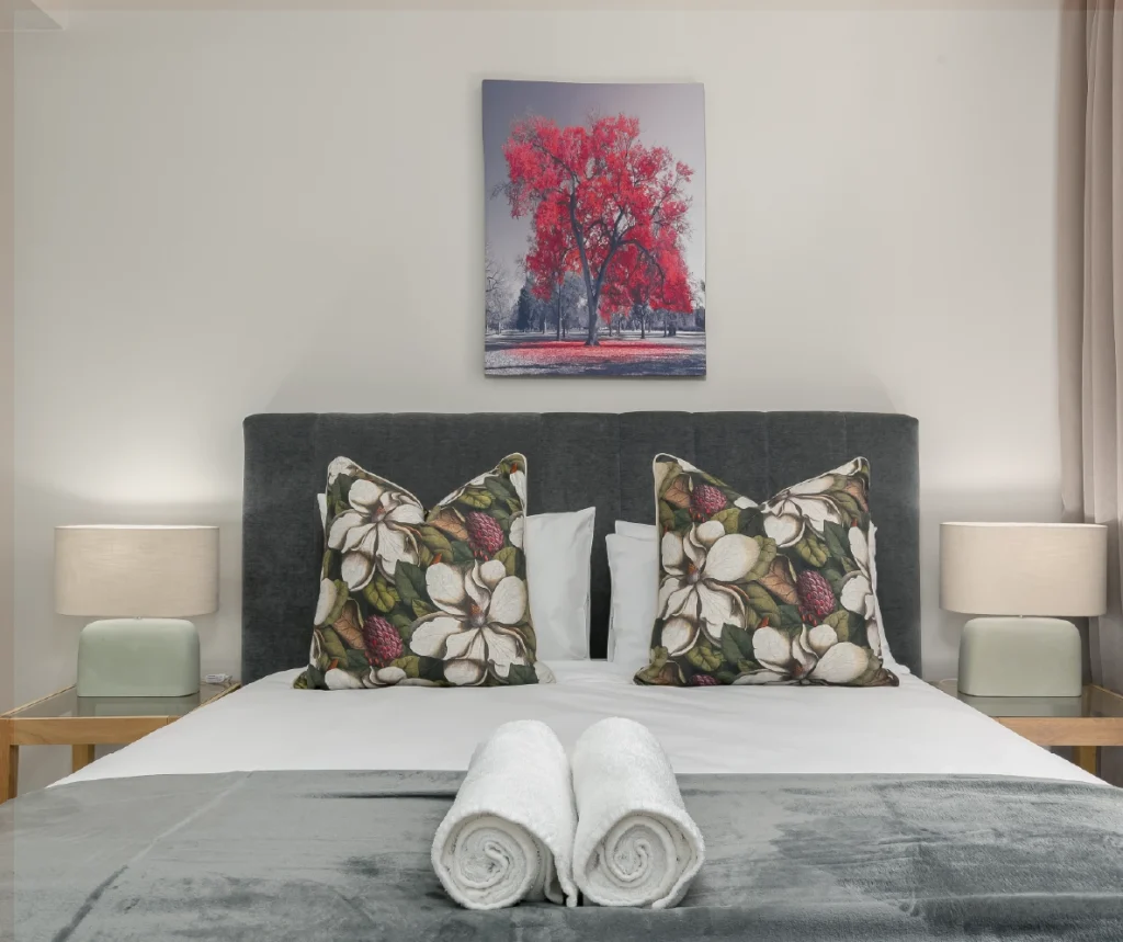 Interior living space of a furnished apartment at Foreshore Place